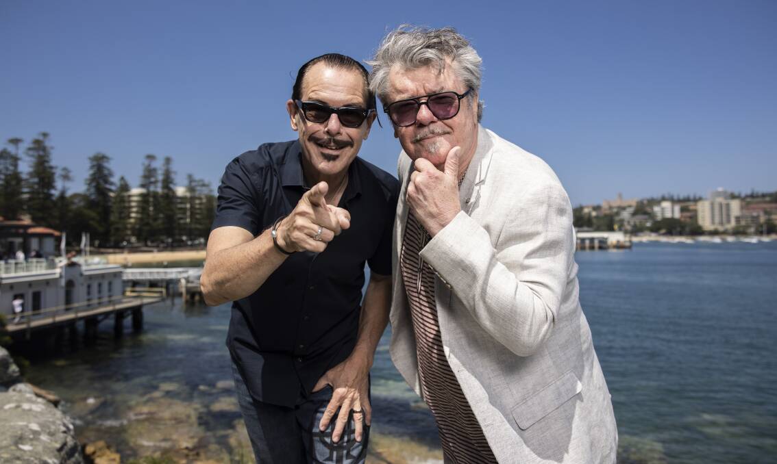 INXS' Kirk Pengilly and Tim Farriss still live in the northern beaches of Sydney where the band grew up and got their start in music. Picture by Simon Bennett
