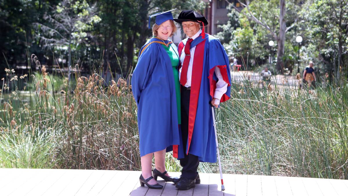 TRAGEDY TO TRIUMPH: Dr Robert Sawyer and his wife Carol Sawyer both graduated at the University of Wollongong on Wednesday. UOW students from three faculties took part in spring graduations. Picture: Sylvia Liber