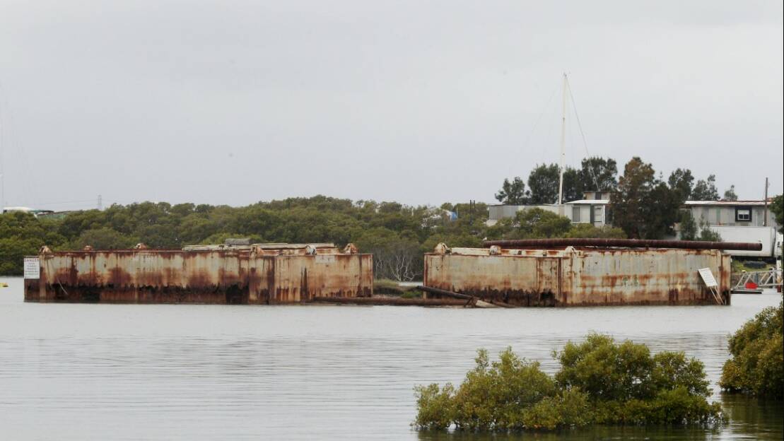 Abandoned barges in Woolooware Bay. Picture: Chris Lane