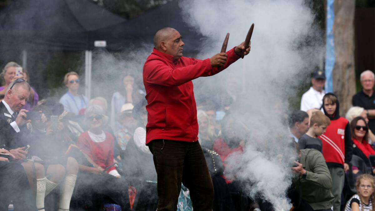 Aboriginal community leader Dean Kelly lights a ceremonial fire at The Meeting of Two Cultures commemoration at Kurnell in 2019. Picture: John Veage