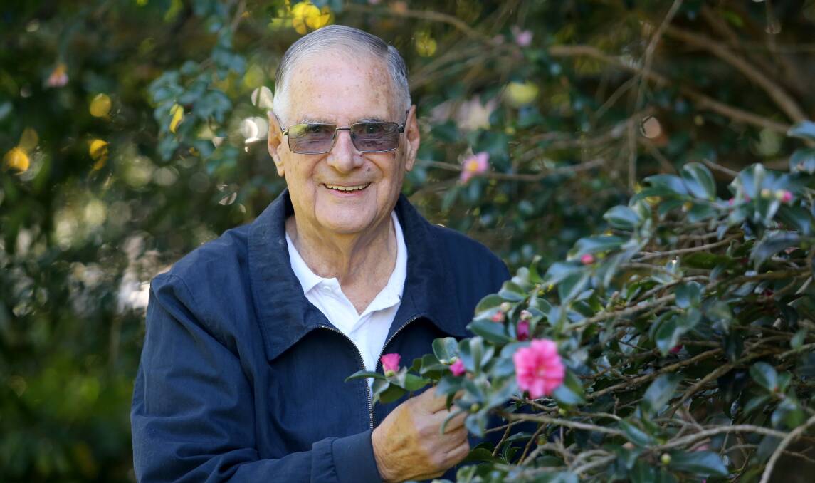 "Me time": Bert Peachey relaxes amid the beauty of the Camellia Gardens after completing 60 years as a volunteer. Picture: supplied