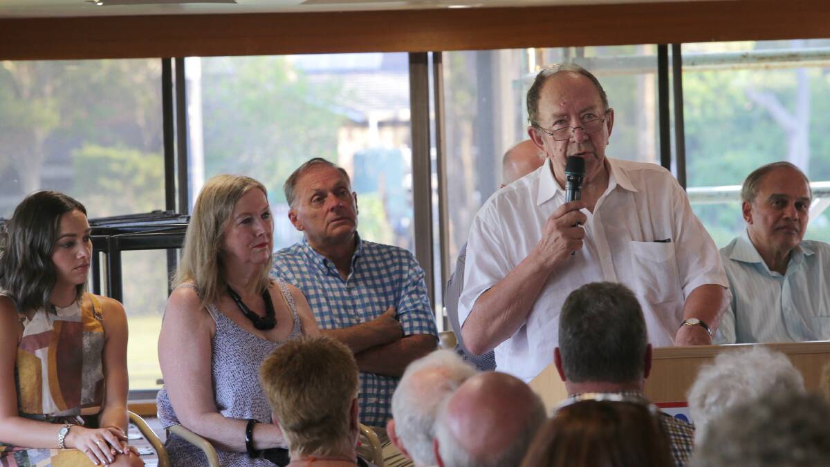 Professor Denis King watched by Alana and Linda Phadke and former MP Malcolm Kerr. Picture: John Veage
