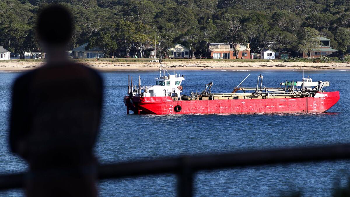 A dredge in Port Hacking during an earlier operation. Picture: John Veage