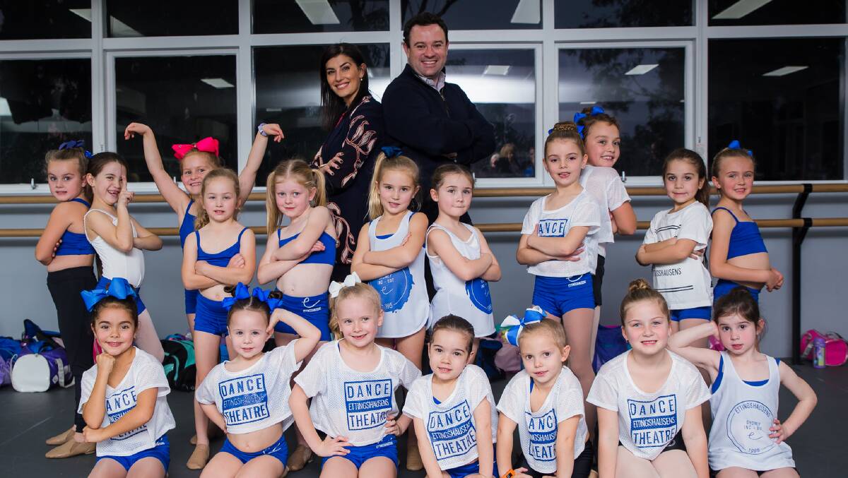 Stuart Ayres and Eleni Petinos promote the Active Kids scheme with children at Ettingshausens Dance and Martial Art School. Picture: supplied