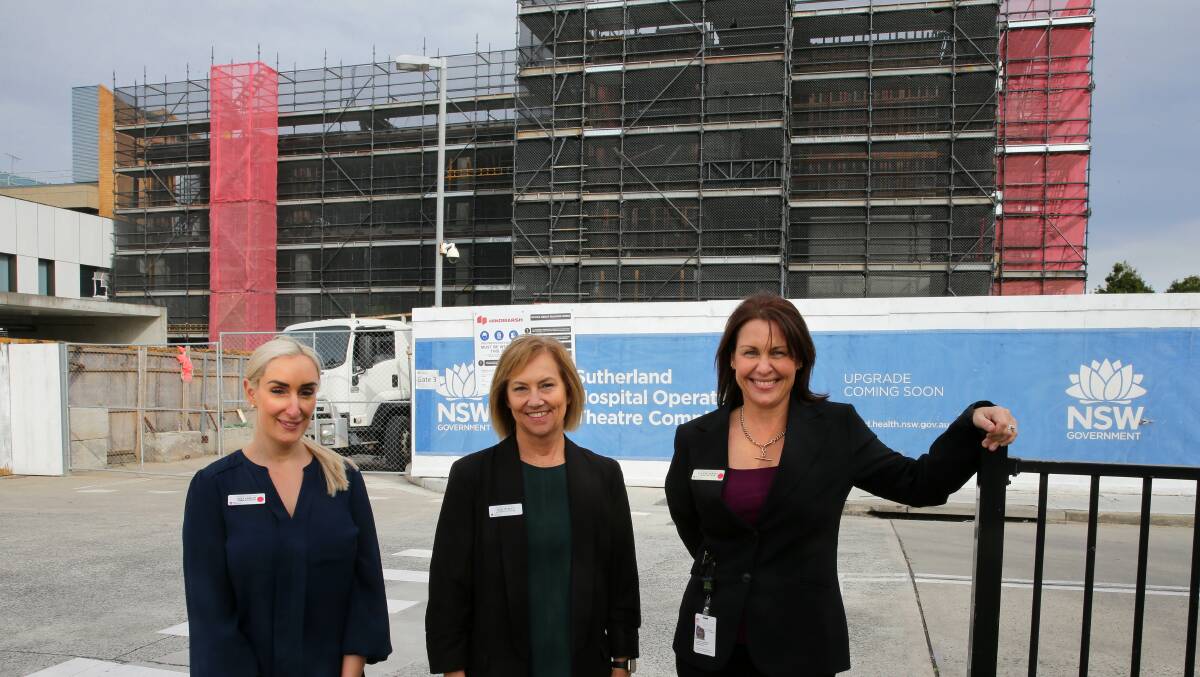 Sutherland Hospital's Sara Hogan (nurse manager), left, Vicki Weedon (general manager) and Leanne Horvat (critical care nurse manager) in front of the partially completed operating theatres complex. Picture John Veage