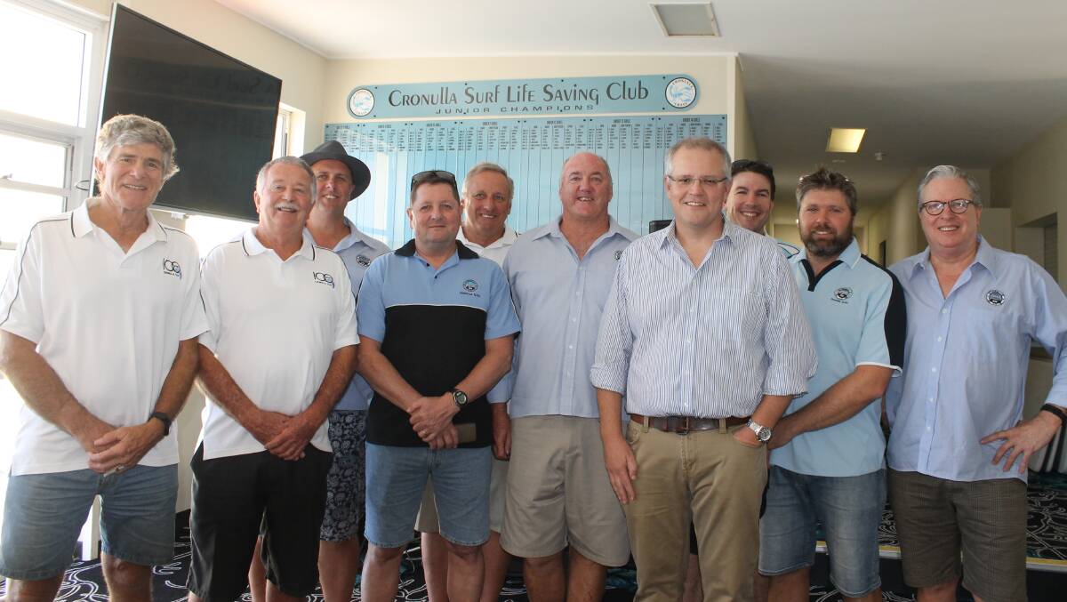 Welcome news: Scott Morrison and officials of Cronulla Surf Life Saving Club, who are pleased to have filled a $3 million funding hole. Picture: supplied