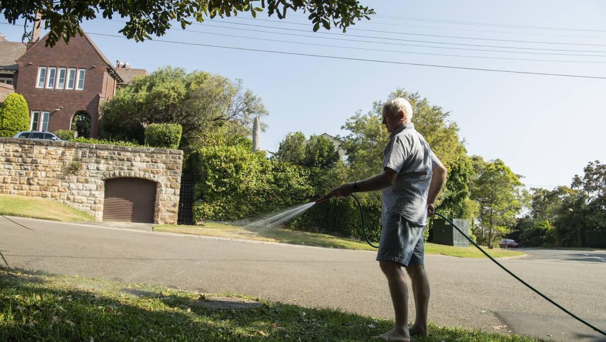 Watering gardens with a hose will be banned from December 10 when Level 2 restrictions start. Picture: Louise Kennerley