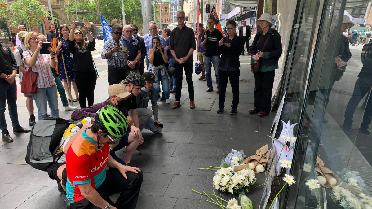 Food delivery riders pay their respects. Picture: supplied