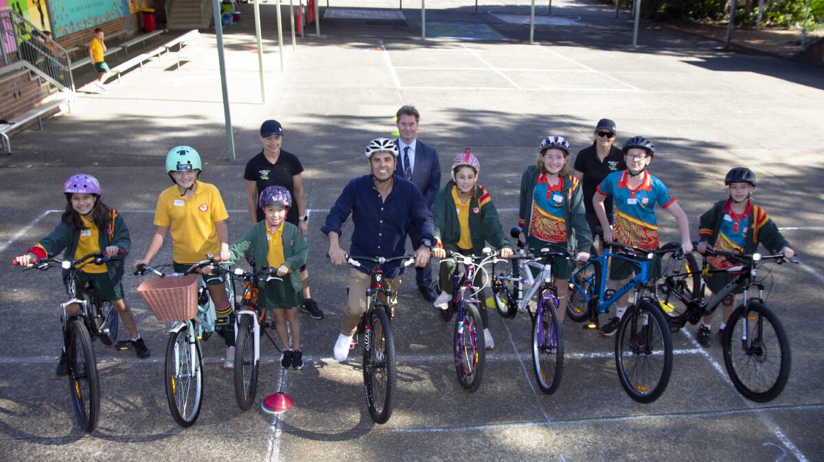 Mayor Carmelo Pesce with pupils at Miranda North Public School, principal Ross Angus and cycling trainers. Picture: supplied