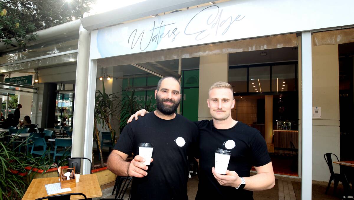 George Mikhail (left) and Zac Sweeney at the new Waters Edge cafe-bar at Cronulla. Picture: Chris Lane