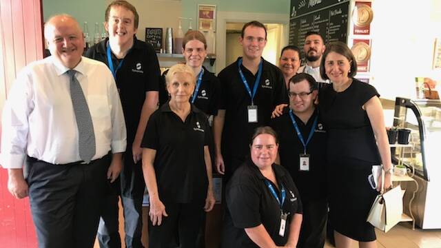 Gladys Berejiklian and Lee Evans with staff at Birdcage Cafe at Engadine. Picture: supplied