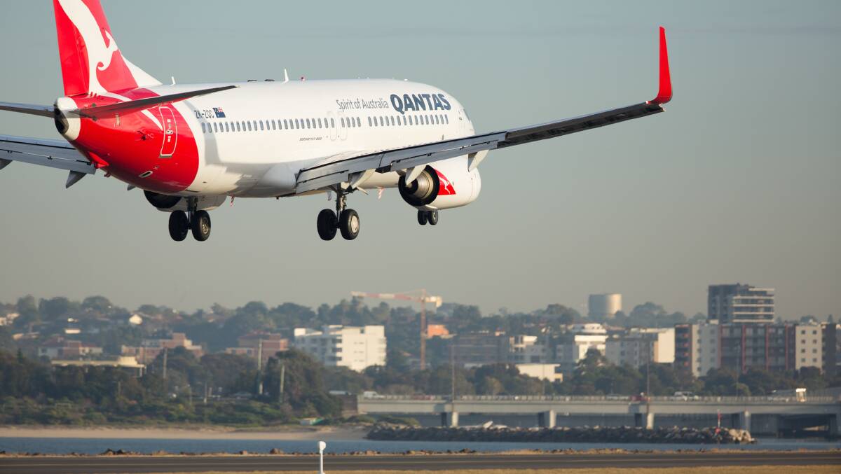 A Boeing 737-800 takes off from Sydney Airport. Picture: Brent Winstone