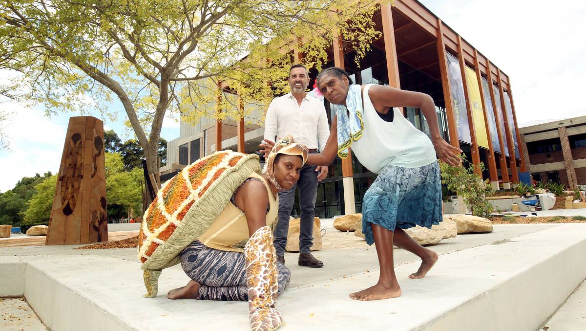 Waru performers Elma Kris (story-teller) and Aba Bero (in turtle costume) with mayor Carmelo Pesce outside The Pavilion Performing Arts Centre, which opens on Saturday. Picture by Chris Lane