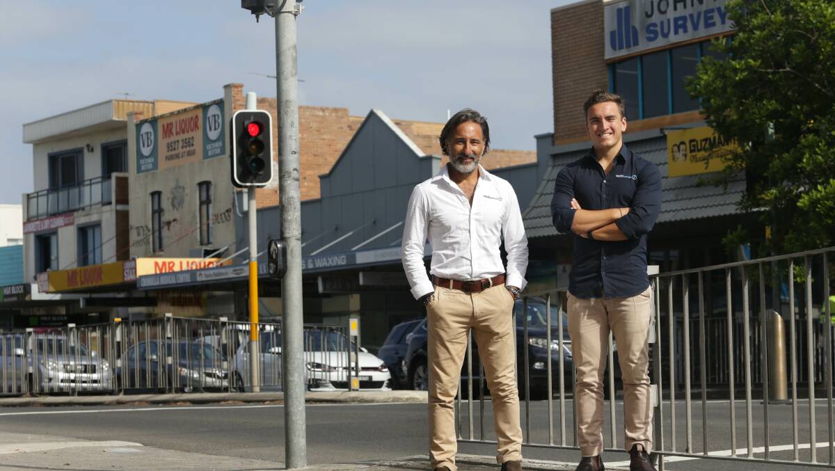 Amalgamation completed: Allen and Julian Sammut at the top of the mall, with the development site in the background. Picture: John Veage