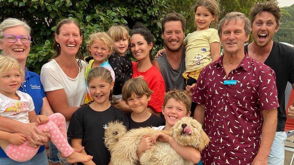 One of many uplifting stories to come out of the bushfires. Amanda Findley, Mayor of Shoalhaven City Council (far left) and holidaymaker Brett Cripps with 11 people and their dog, whom he saved at Lake Conjola on New Year's Eve by cramming them into a small boat after his house caught fire. Picture: Facebook