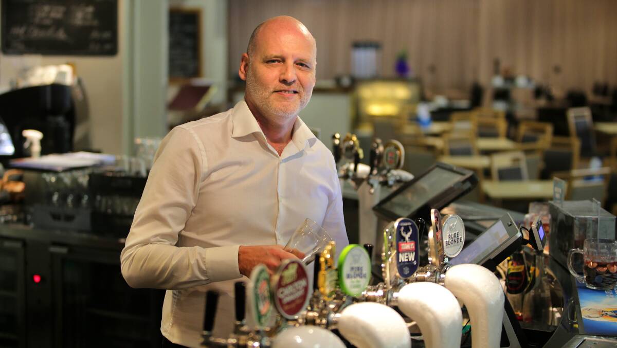 Simon O’Brien, 51, has been the bar manager at Woolooware Golf Club for the last 18 years. Picture: John Veage