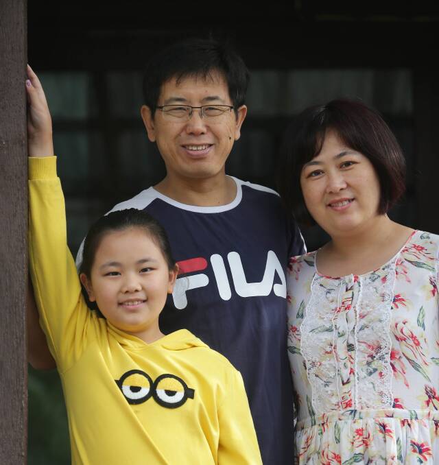 "Excited": Tony, Sandy and Alice Liu are looking forward to becoming Australian citizens. Picture: John Veage