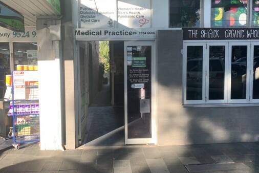 The medical centre has a narrow entrance, consisting of double doors, from the shopping strip, while the adjoining cafe space is much larger. Picture: DA