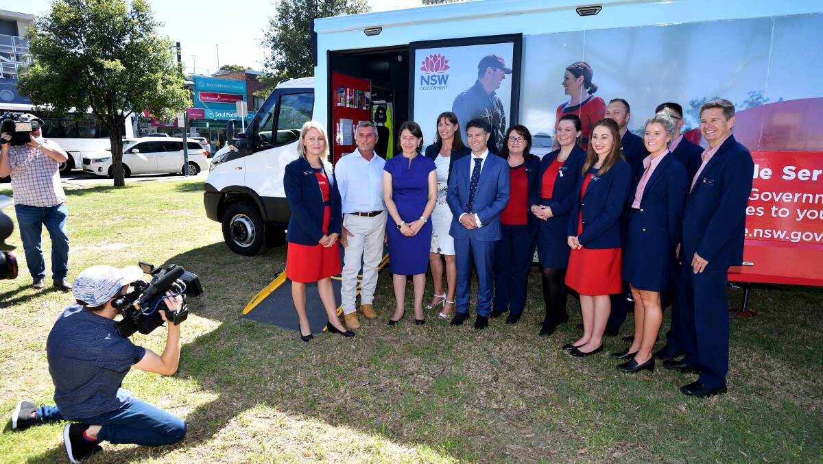 Premier Gladys Berejiklian announces 10 new Service NSW centres in Sydney and four buses for regional areas. Picture: Joel Carrett / AAP