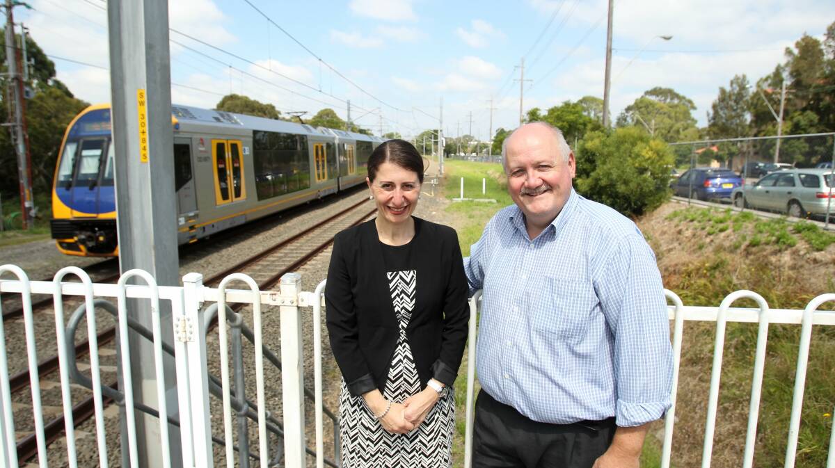 Rewind two years: Gladys Berejiklian and Lee Evans announce the new commuter car park at Engadine station before the last election. Picture: Chris Lane
