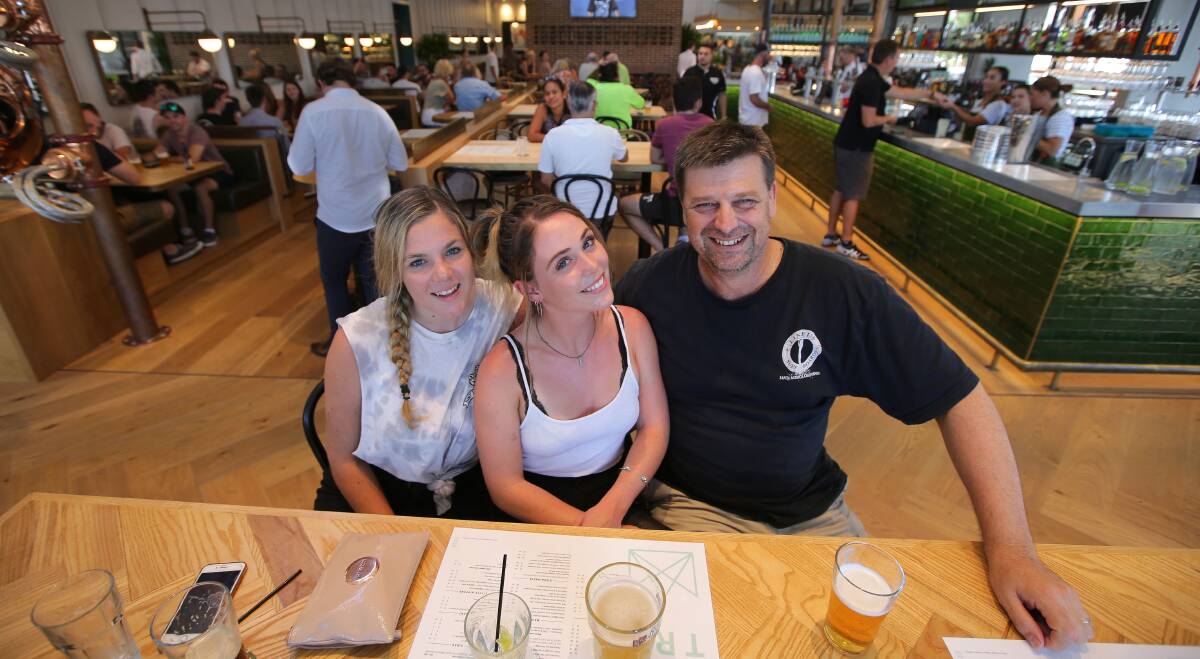 "Awesome" start: Zoe, Kate and Arthur were among more than 1000 people estimated to have walked through the doors of the new hotel on Princes Highway, Kirrawee, on opening day. Picture John Veage