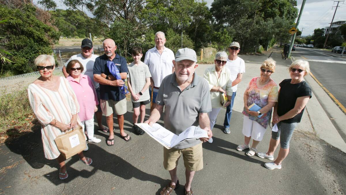 Willarong Road residents in front of the the former Caringbah High School site where 686 units could be built. Picture by John Veage