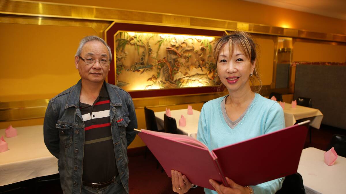 Saying goodbye: Teresa Ng and Raymond Poon, who has worked with her since she became a partner in Caringbah Chinese Restaurant 21 years ago. Picture: John Veage