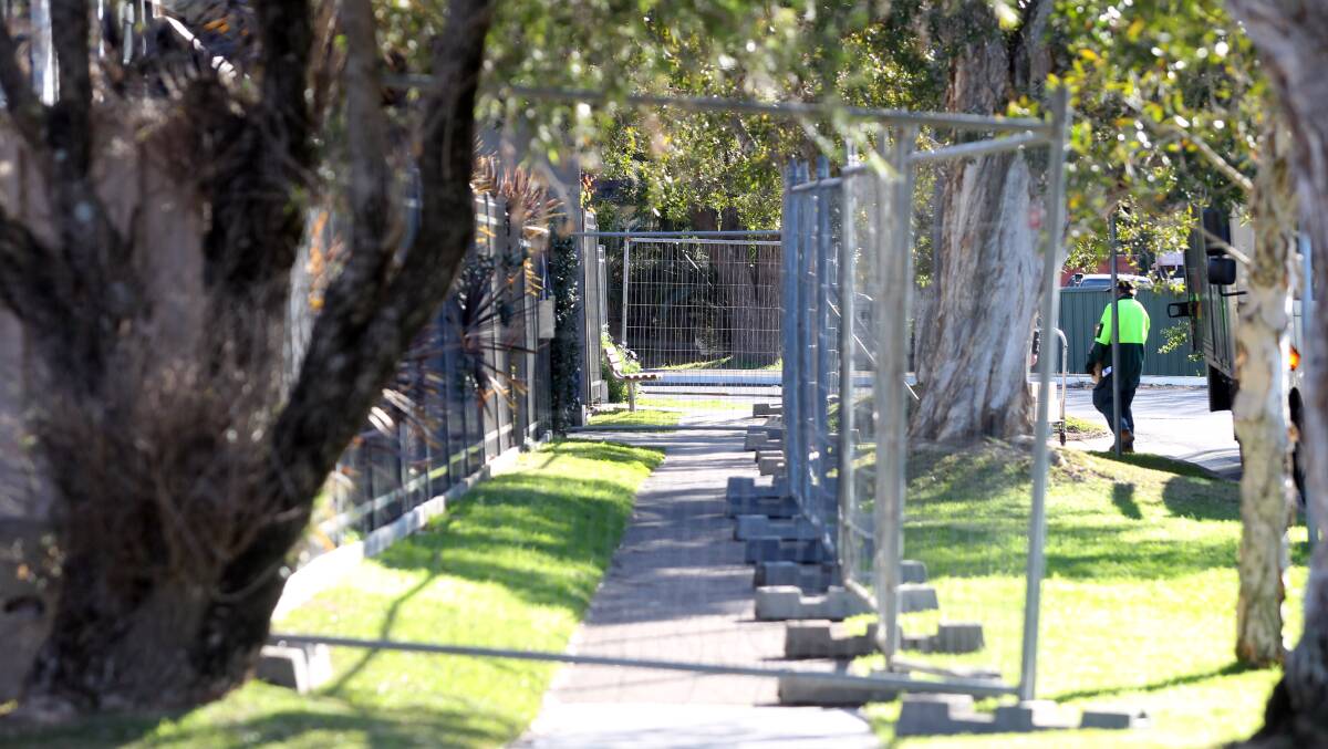 Temporary fencing has been erected around the aged care centre. Picture: Chris Lane