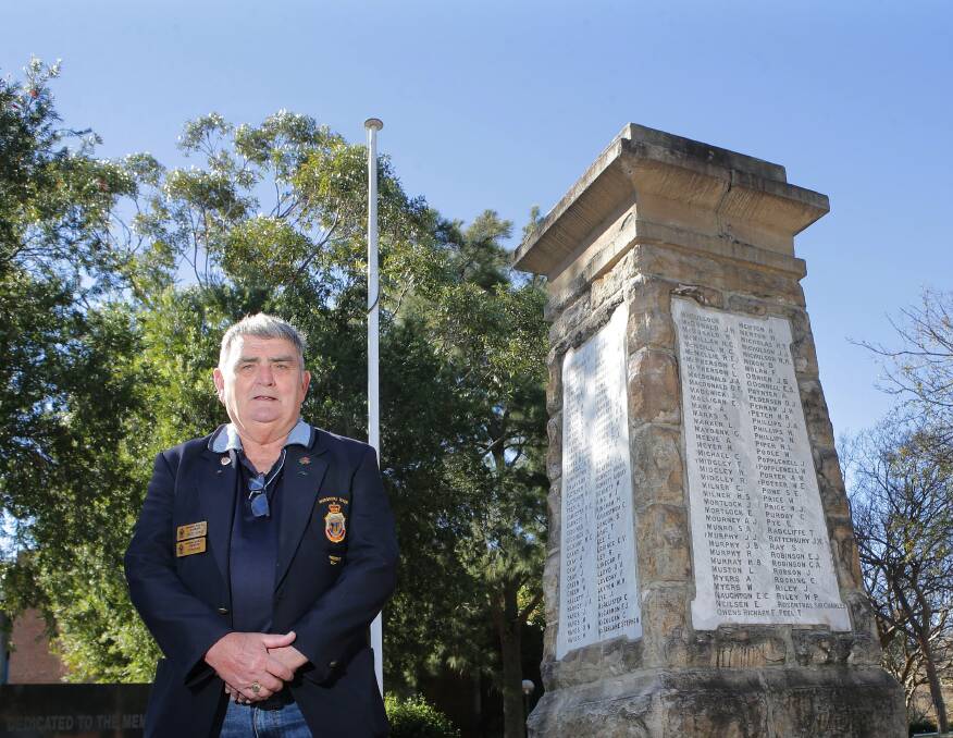 Barry Grant next to the 1921 monument in Peace Park, Sutherland. Picture: John Veage