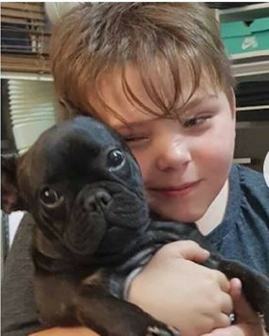 "Inconsolable": Dominic Yule with his puppy Kamia, who used to watch over him.Picture: supplied