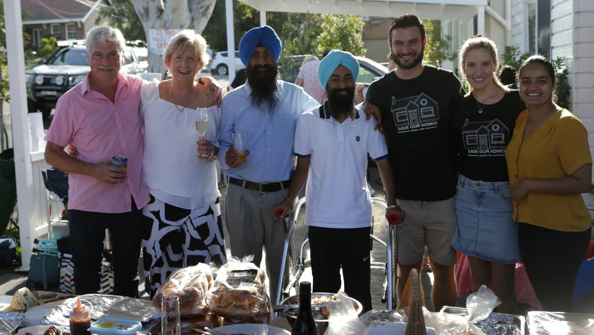 Silver lining: The ordeal has created stronger community bonds. From left - Liam, Helma, Balwinder, Ishpal, Tom, Rachel and Parneet. Picture: John Veage