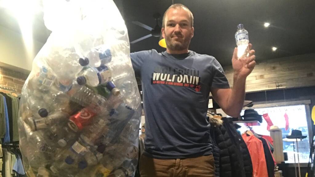 Supporter: Andrew Taylor, who owns AdventureCo in Oatley, collected 600 cans and bottles in the first three days after the scheme started on Friday. Picture: supplied