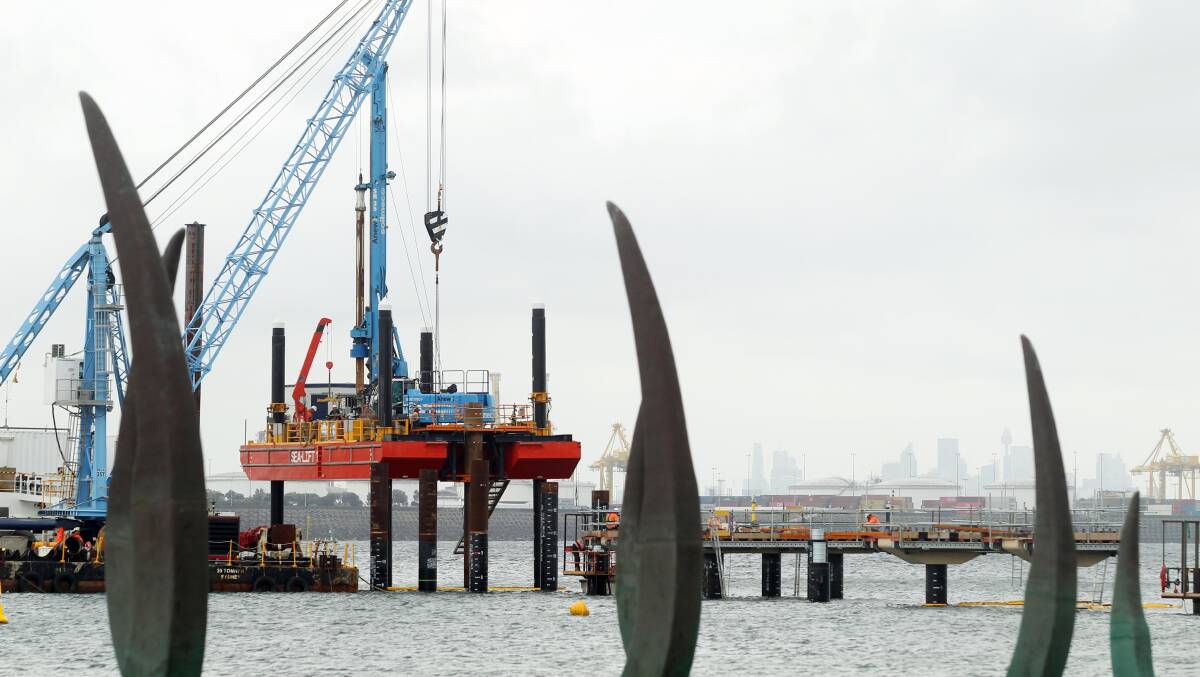 Construction of the ferry wharf at Kurnell, with whale sculpture in foreground. Picture Chris Lane