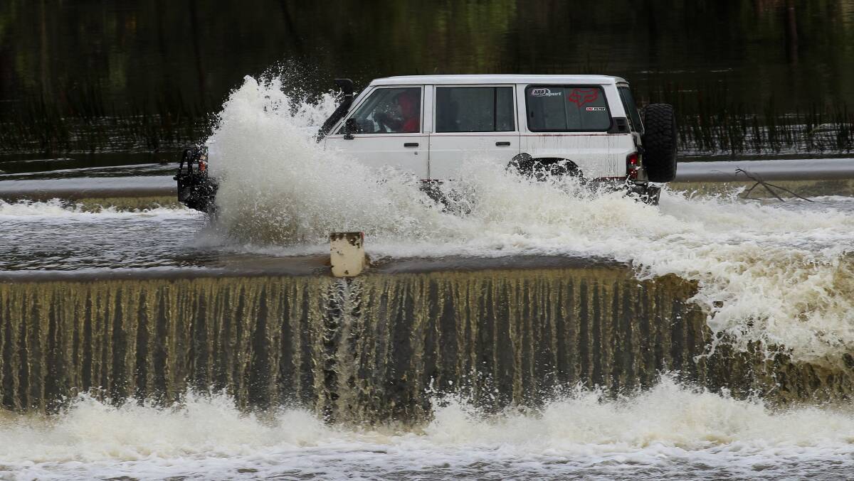 Risky crossing of flooded Audley Weir. Picture: John Veazge