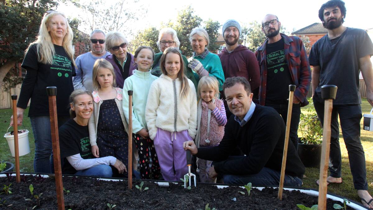 Growing community spirit: Members of a community garden at Cronulla, with MP Mark Speakman, after receiving a grant through the Community Building Partnership Program in 2017. Picture: Chris Lane