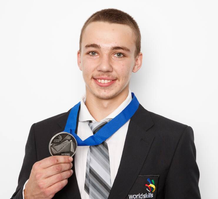 Oska Jory, of Caringbah, with his silver medal. Picture: supplied