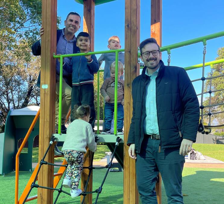 Mayor carmelo Pesce and Cr Jack Boyd with local children at the renewed Old School Park, in Gymea Bay. Picture: supplied