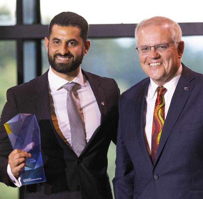 "Humbling" honour: Dr Daniel Nour with Prime Minister Scott Morrison after being named 2022 Young Australian of the Year. Picture: Keegan Carroll, ACM