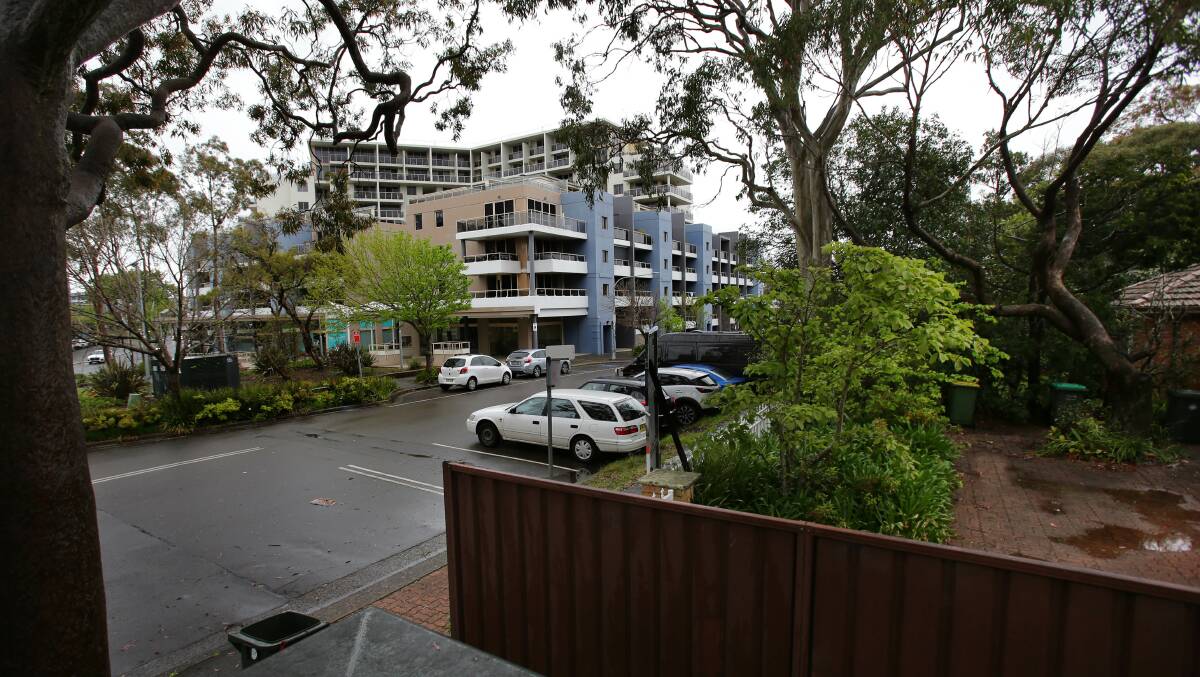 The three properties that could be made into a park are In Willarong Road, diagonally opposite the Meriton building. Picture by John Veage