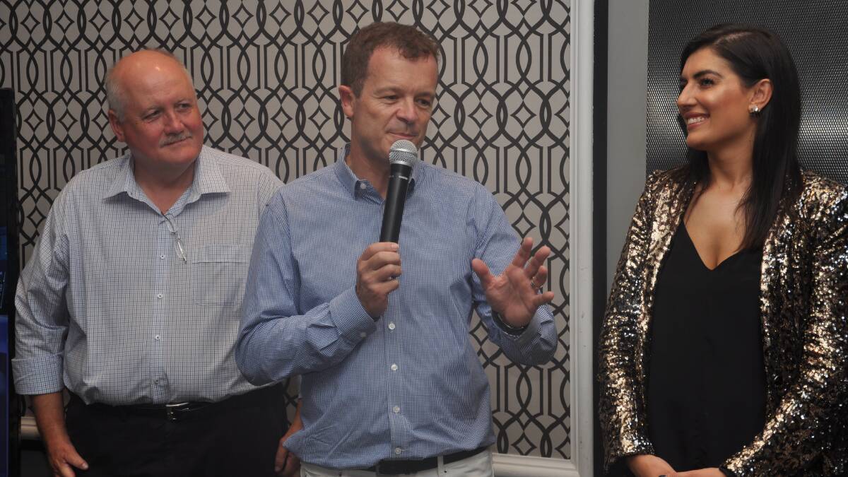 Mark Speakman, Lee Evans and Eleni Petinos at the Liberal Party gathering on election night.
