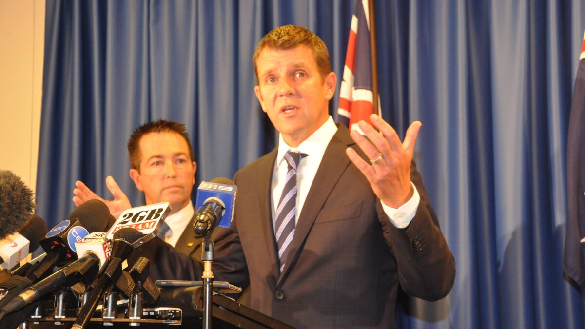 Merger announcement: Premier Mike Baird and Local Government Minister Paul Toole.