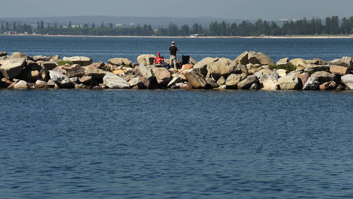 Gone Fishing Day: The breakwater at Kyeemagh is popular. Picture: Kate Geraghty