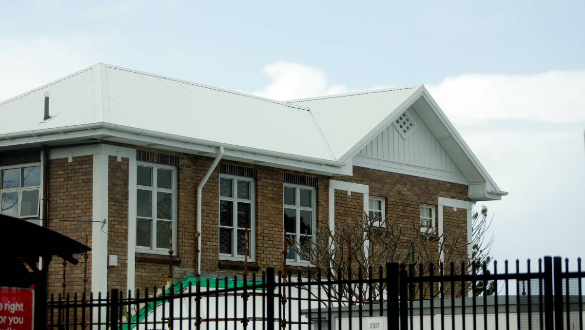 Contractor Jared Keen replaced the old tile roof on Cronulla Public School with DuraKote pre-painted steel through the state government stimulus program. Picture: Chris Lane