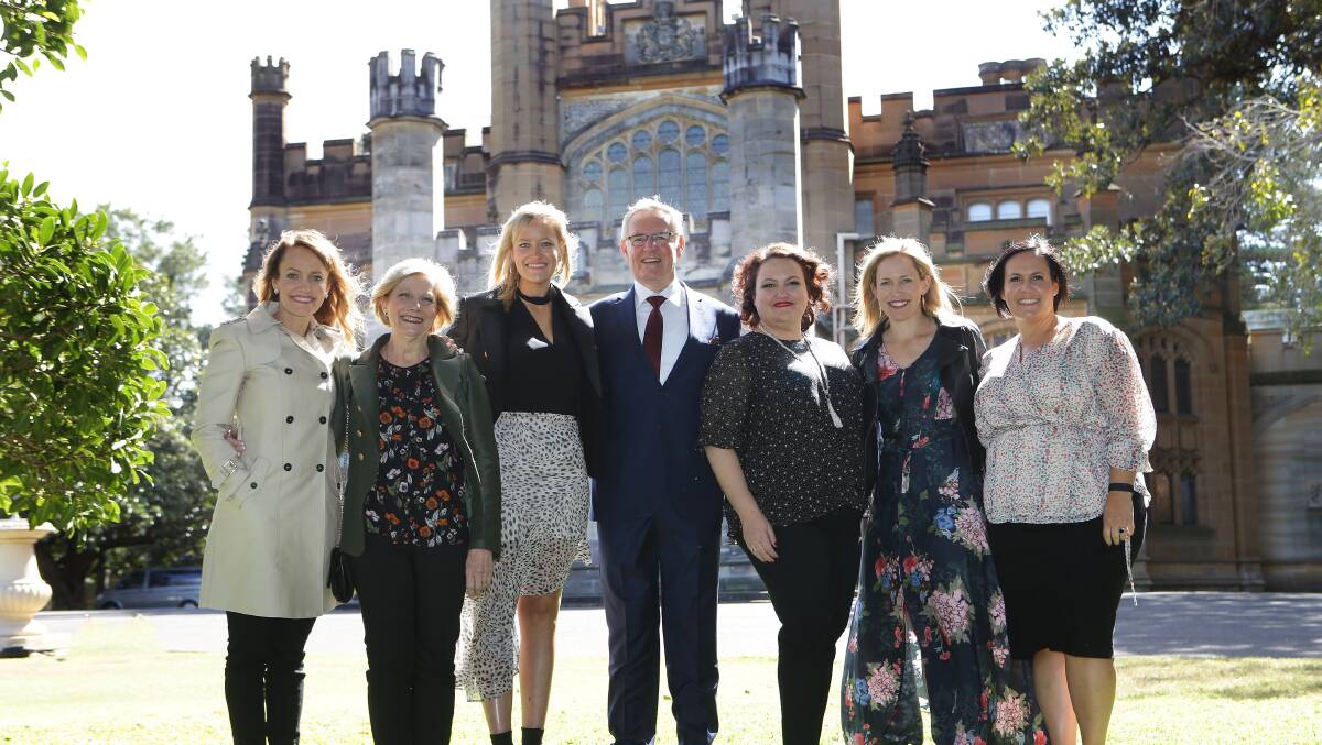 Paul and Robyn Napier with their five daughters at Government House. From left - Kylie, Robyn, Kate, Paul, Debra, Kerrieanne and Amy. Picture: John Veage