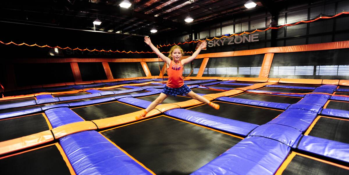 Jumping for joy: Taryn Wallace enjoys the Sky Zone centre in Canberra. The Miranda trampoline park, which will be similar but bigger, is being built in the area where the cinemas were previously located. Picture: Melissa Adams