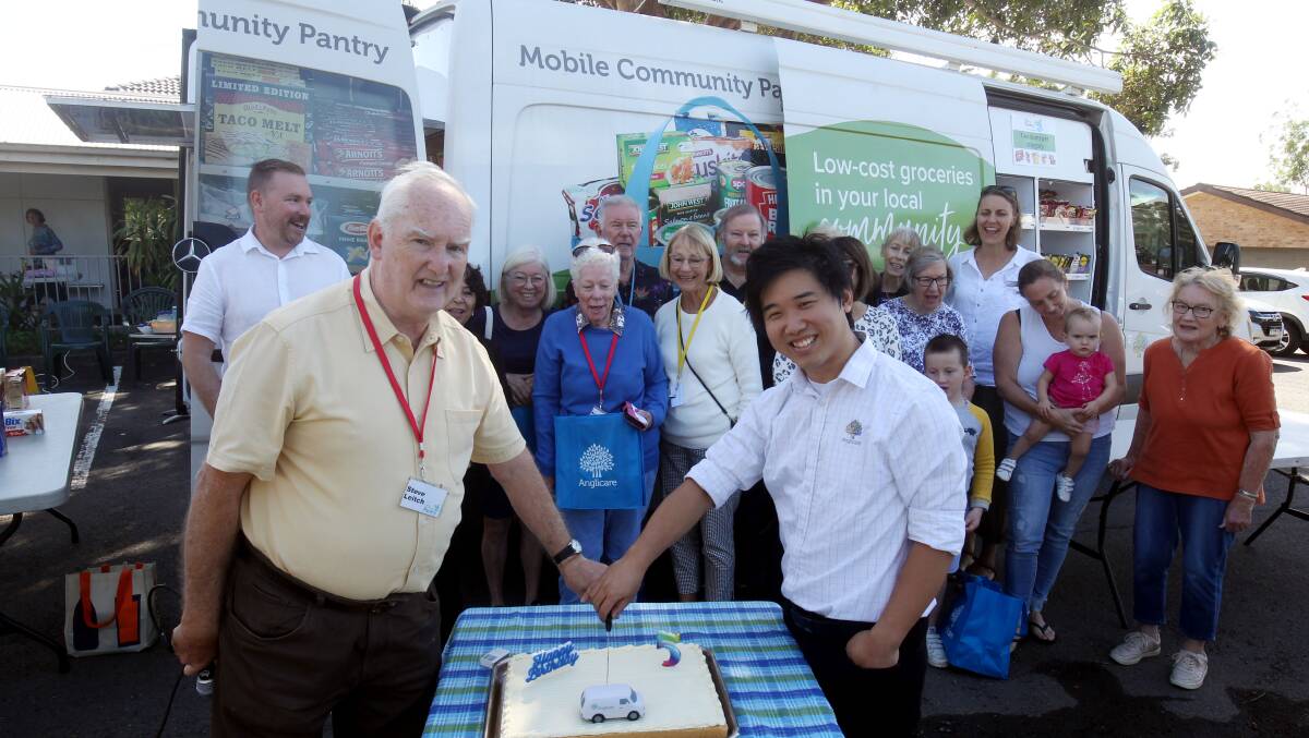 Food Pantry co-ordinator. Leitch (left) and Aaron Li from Anglicare celebrate the fifth anniversary of the service. Picture by Chris Lane