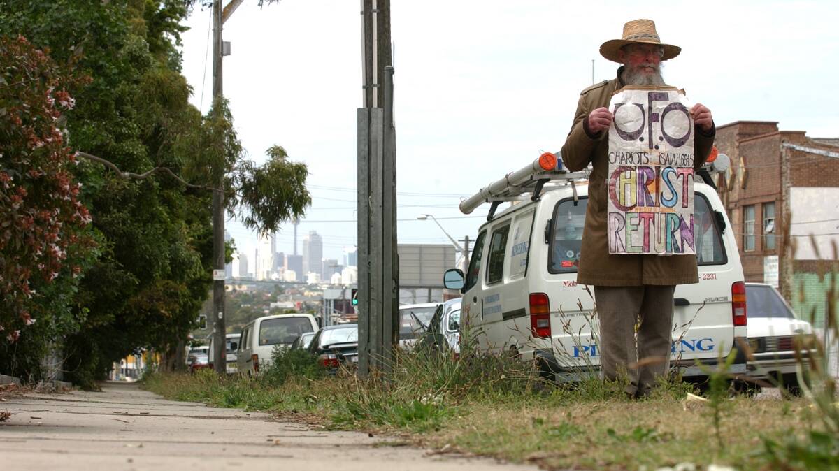 Alan Philp, better known as “the Arncliffe UFO man”, on the edge of Princes Highway, Arncliffe.
