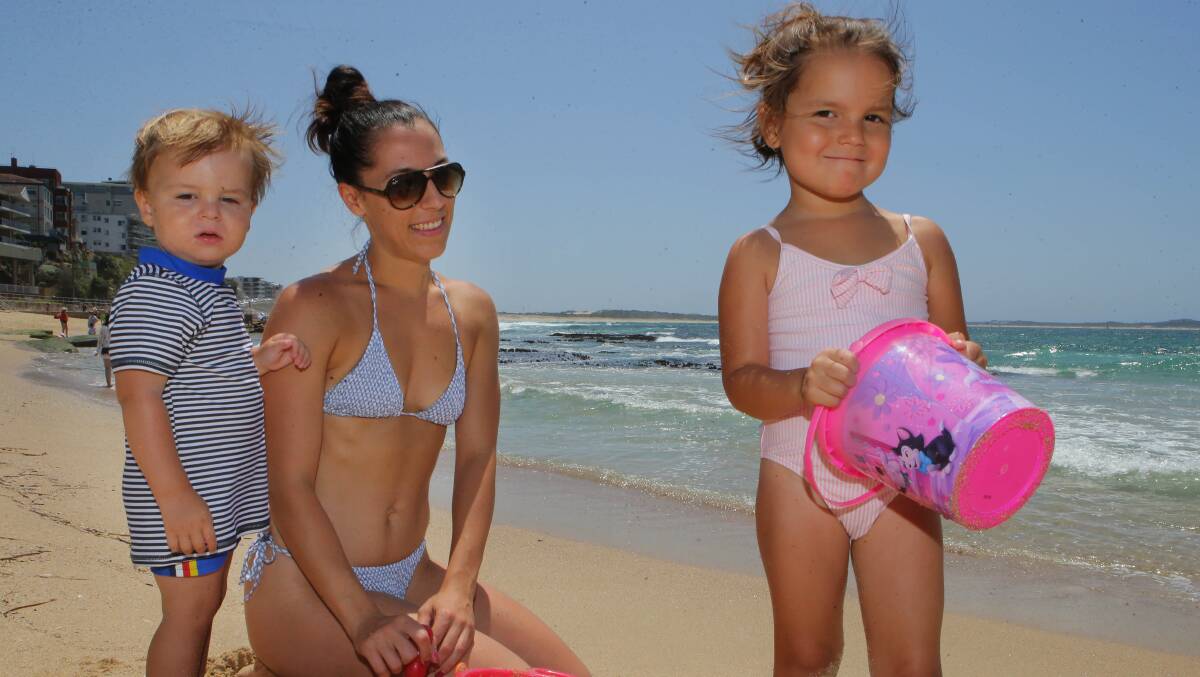 Natalie Trpeski enjoys Cronulla beach with her children, Anabelle, 3, and Nicholas, 2, earlier this year. The council wants people to continue enjoy beaches by keeping numbers below 500. Picture: John Veage