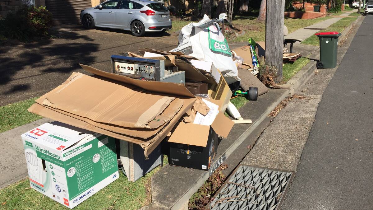 Council clean-up items on Kingsway at Caringbah. 