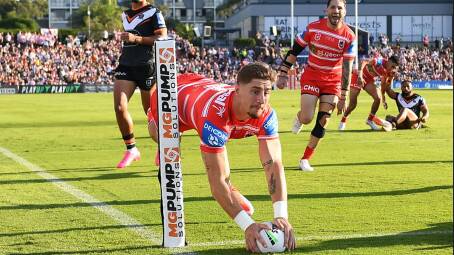 Zac Lomax scores the first try for the Dragons against Wests Tigers at Campbelltown. Picture NRL Images